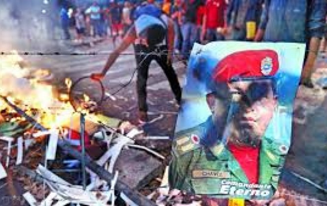 Las protestas y movilizaciones continúan en Venezuela a un año de la muerte del comandante Hugo Chávez/ Foto www.clarin.com