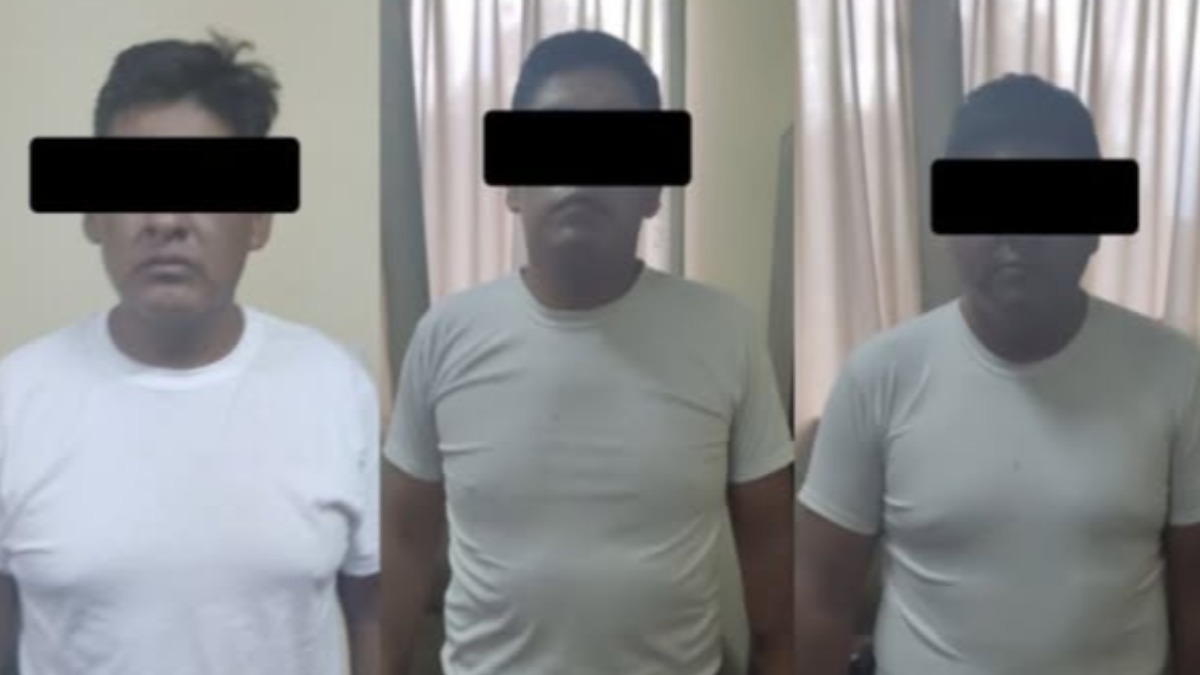 Los tres efectivos policiales aprehendidos. Foto: Ministro de Gobierno
