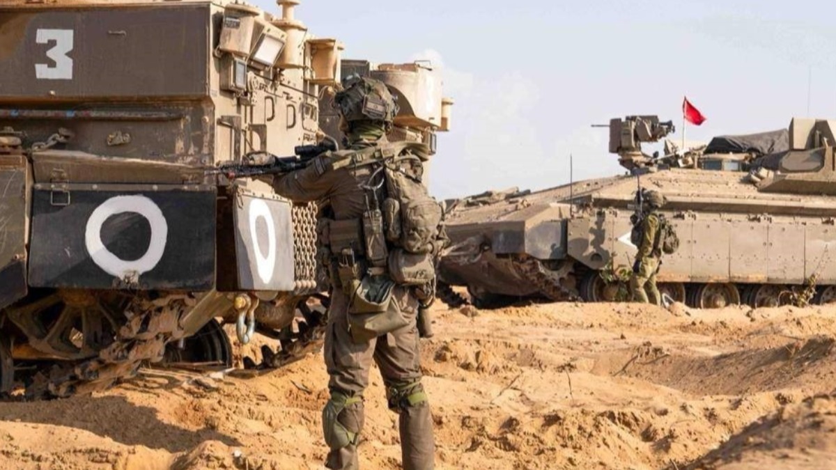 Soldados y vehículos militares israelíes en la Franja de Gaza.