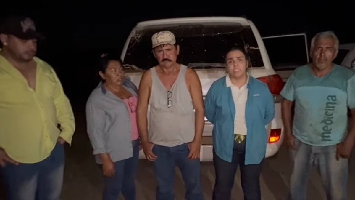 Trabajadores y propietarios del predio avasallado. Foto: Captura de video